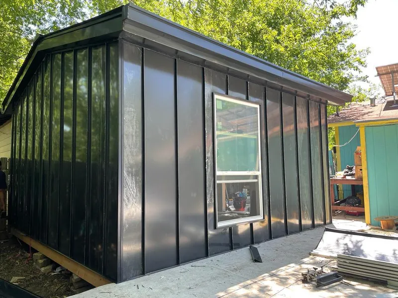 Black standing seam metal wall panels for Metal Roof Installation in Old Jamestown