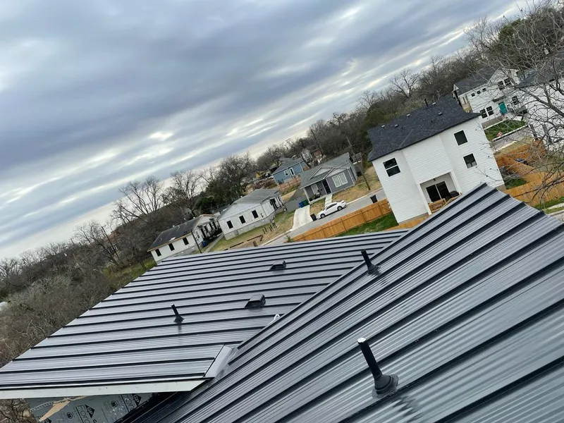 Standing seam metal roof panels with vents for Skylight Repair in Old Jamestown